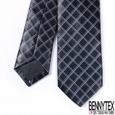 Cravate soie motif argenté moûcheté fond noir profond