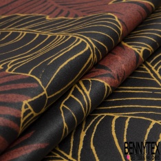 Coton enduit imprimé feuillage tropicale géant sapin or de pépite fond noir