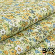 Coton imprimé minuscule fleur ton jaune rose bleu aquarelle fond blanc