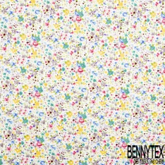 Coton imprimé petite fleur gracieuse ton bleu violine fond blanc discret