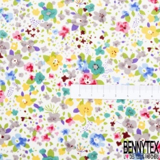 Coton imprimé petite fleur gracieuse ton bleu violine fond blanc discret