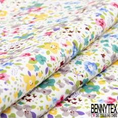 Coton imprimé petite fleur gracieuse ton bleu violine fond blanc discret