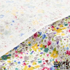 Coton imprimé petite fleur gracieuse ton bleu violine fond blanc discret