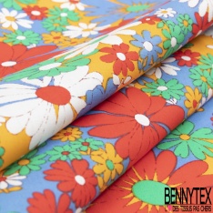 Coton grand imprimé floral seventie's fond jaune pastel