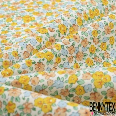 Coton grand imprimé marguerite seventie's pomme blanc violet rouge fond orange rouge