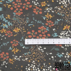 Mousseline polyester grande rose ton émeraude feuillage mylar or