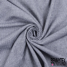 Maille jacquard motif grande tâche chinée noir écru abricot orangé