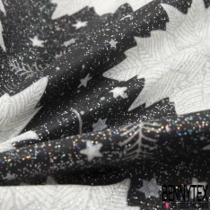 Coton enduit imprimé edelweiss fond noir paillette irisée