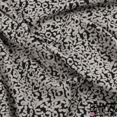 Coupon 3m maille gaufrée motif léopard angora fond noir