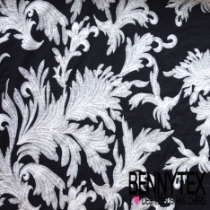 Voile de coton brodé festonné double base grand feuillage écru fond noir