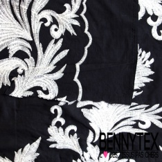 Voile de coton brodé festonné double base grand feuillage écru fond noir