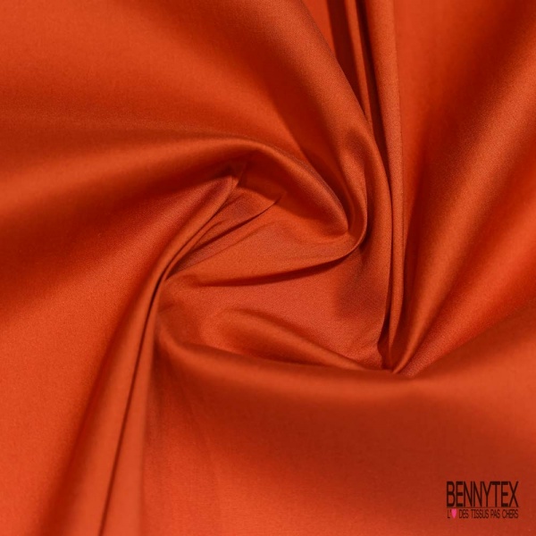 Popeline coton polyamide élasthanne uni orange brûlée