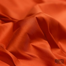 Popeline coton polyamide élasthanne uni orange brûlée