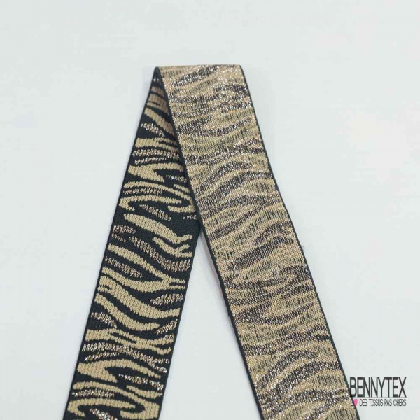 Bande élastique motif zébrure beige lurex argent fond noir