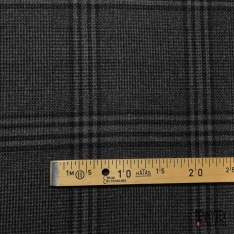 Natté de laine poilue léopard noir fond beige chaud