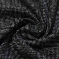 Natté de laine poilue léopard noir fond beige chaud