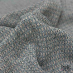 Laine bouillie chinée jaune or blanc discret façon sergé noir en relief