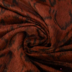 Natté de laine poilue léopard noir fond beige chaud