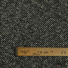 Tricot de laine bouclette noir blanc discret