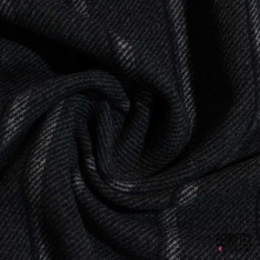 Sergé de laine laqué ton sur ton noir corbeau