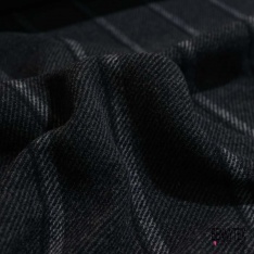 Sergé de laine laqué ton sur ton noir corbeau