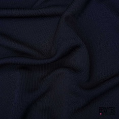 Maille polyester élasthanne uni blanc cassé