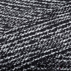 Laine tricot fantaisie ton chaud motif abstrait