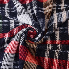 Tricot fantaisie damier asymétrique multicolore rouge noir olive moutarde