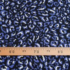 satin de viscose guepard fond noir tache