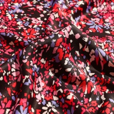 satin polyester imprimé souple fond noir tacheté