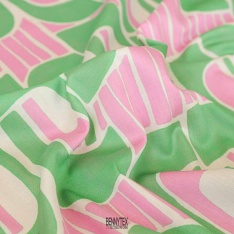 satinette de coton dessin geometrique fond beige ton de rose et vert clair