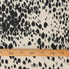 voile viscose soie tache noir fond beige