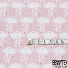 Coton imprimé motif méduse blanche sur fond rose
