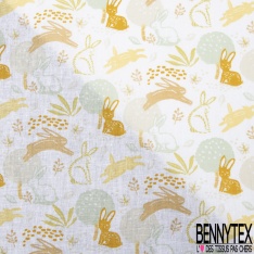 Coton imprimé esprit toile de jouy fond or pépite
