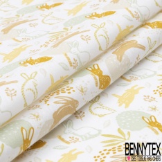 Coton imprimé esprit toile de jouy fond or pépite