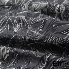Gabardine coton sergé élasthanne motif grande feuille tropicale superposée noir mer apaisante fond bleu canard