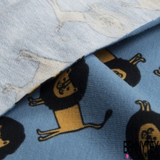 Jersey Coton Elasthanne motif petit lion naïf fond bleu calme