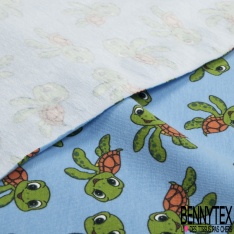 Jersey Coton Elasthanne motif petites tortues rigolotes fond bleu calme