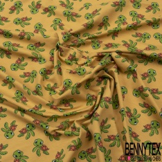 Jersey Coton Elasthanne motif petites tortues rigolotes fond jaune d'oeuf