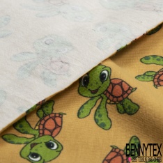 Jersey Coton Elasthanne motif petites tortues rigolotes fond jaune d'oeuf
