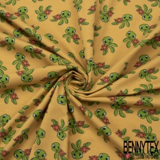 Jersey Coton Elasthanne motif petites tortues rigolotes fond jaune d'oeuf