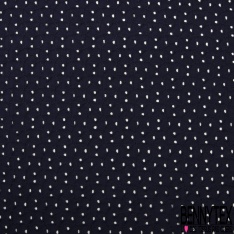 Broderie anglaise coloris rouge minéral motif petit trou relié par broderie ton sur ton