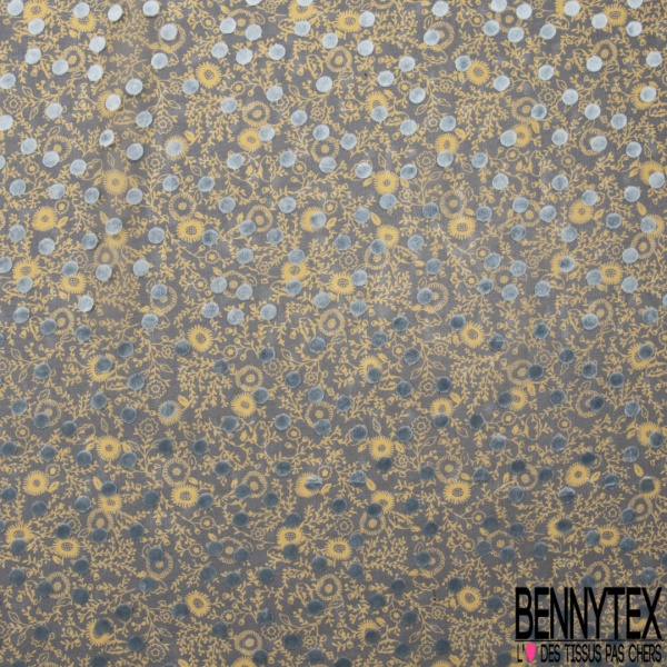 Mousseline polyester motif floral or de pépite fond nuit floquée pois velours ras bleu de rêve