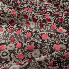 Mousseline polyester motif floral or de pépite fond nuit floquée pois velours ras bleu de rêve