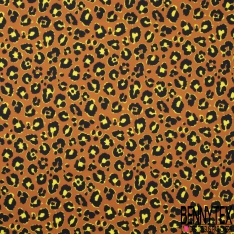 Satin de coton élasthanne imprimé léopard noir orange brûlée fond blanc discret