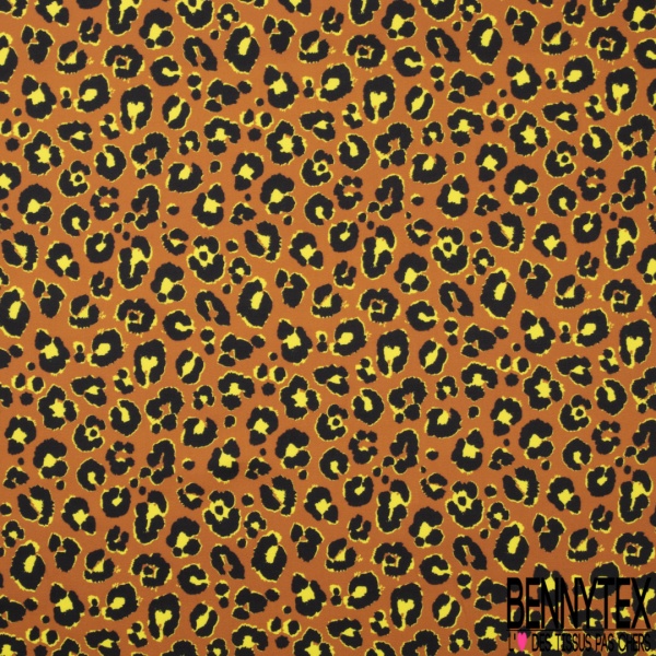 Satin de coton élasthanne imprimé léopard noir orange brûlée fond blanc discret