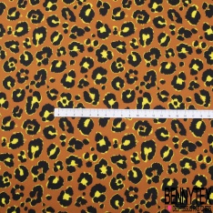 Satin de coton élasthanne imprimé léopard noir orange brûlée fond blanc discret