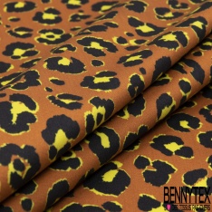 Satin de coton élasthanne imprimé léopard noir orange brûlée fond blanc discret