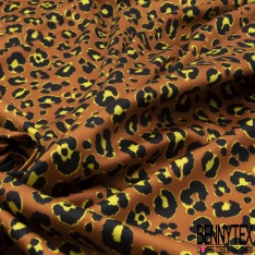 Satin de coton élasthanne imprimé léopard noir orange brûlée fond blanc discret
