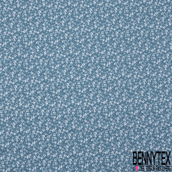 Coton imprimé pensée sauvage coloris blanc sucre brun bleu argent fond sable mouvant